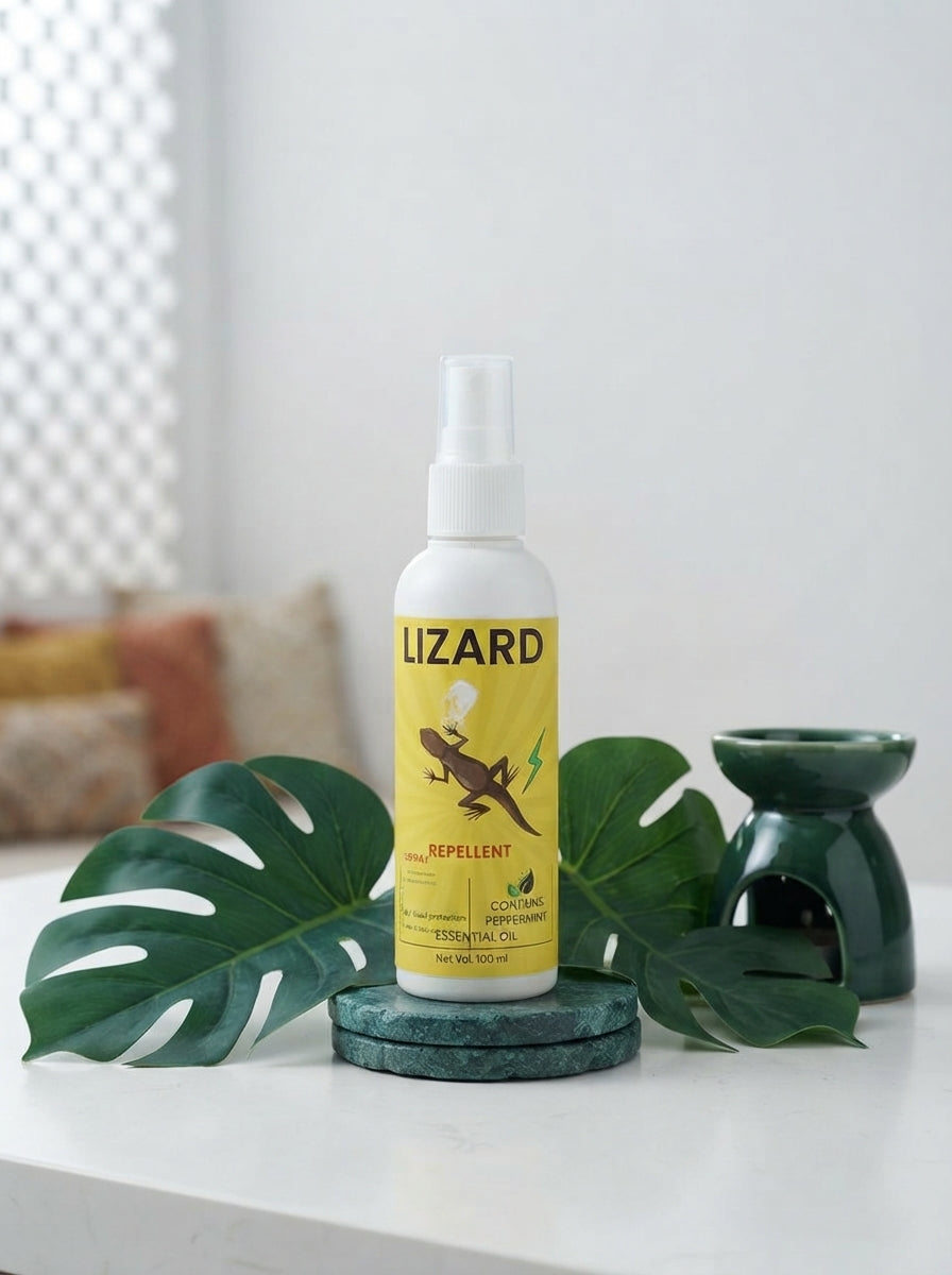 A 100ml bottle of lizard repellent spray placed on a white surface with green leaves and teal decor in a modern Indian home s
